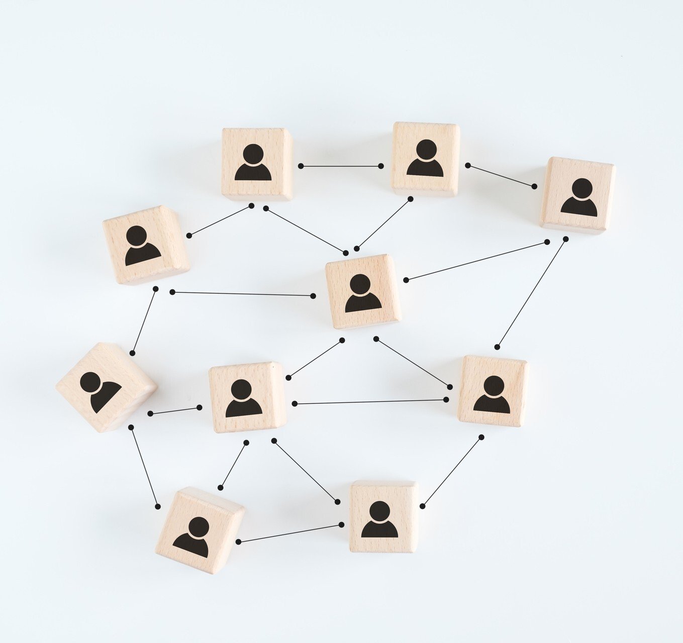 medium-vecteezy_teamwork-connection-building-a-strong-team-wooden-blocks_10813278_medium